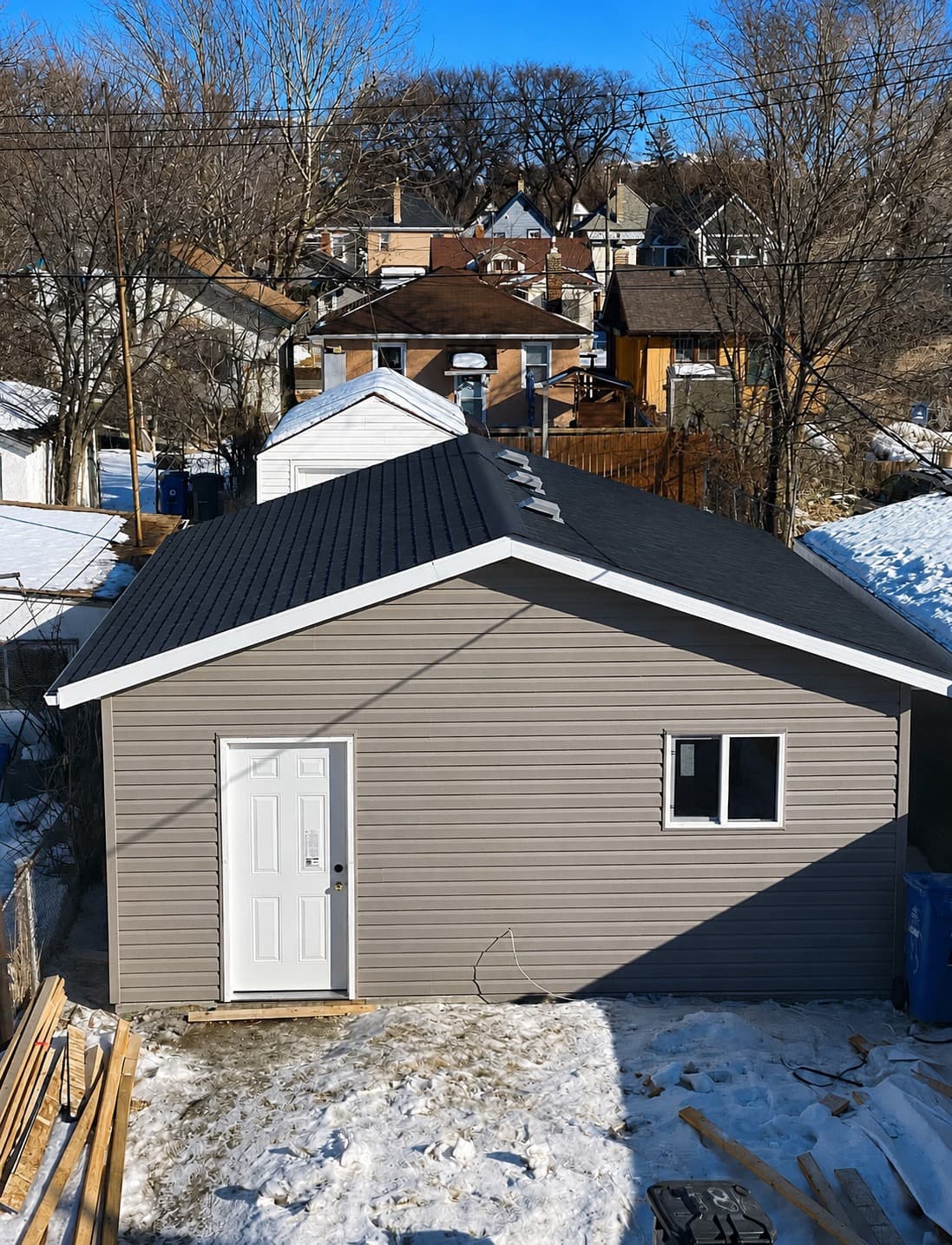 Detached custom garage exterior in winter