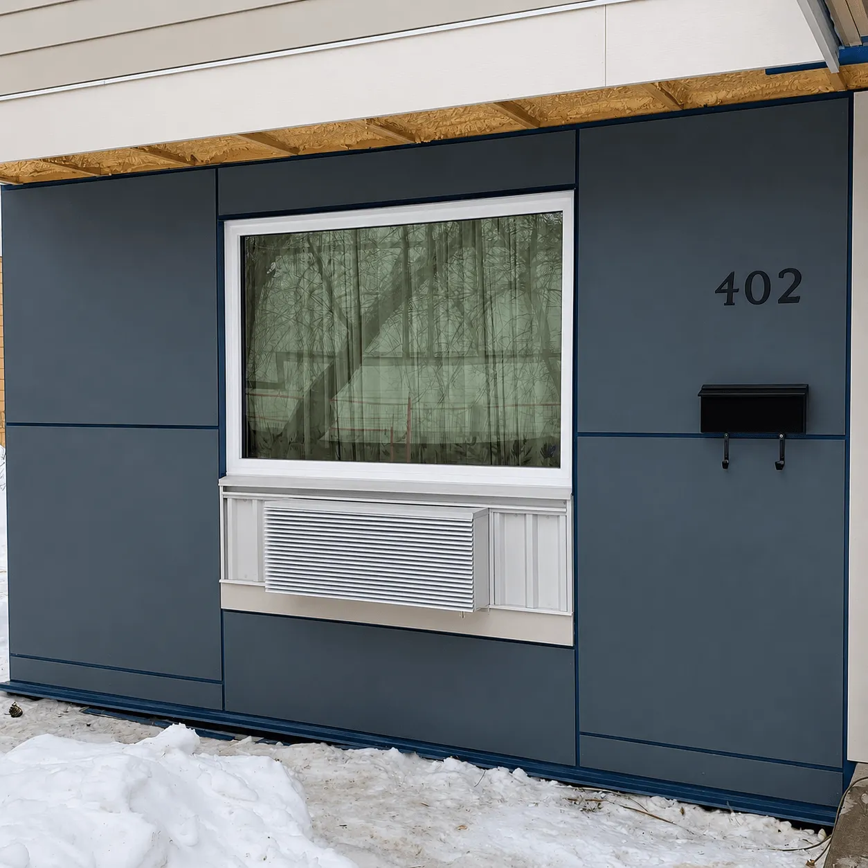 Spartan Builders Exterior Siding Window Renovation