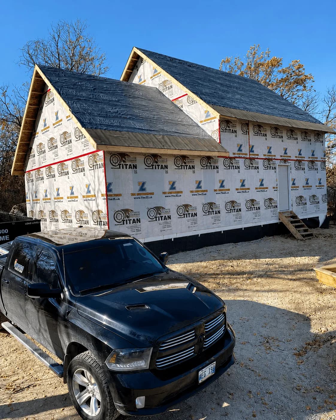 Spartan Builders Custom Home Roof Sheathing Housewrap