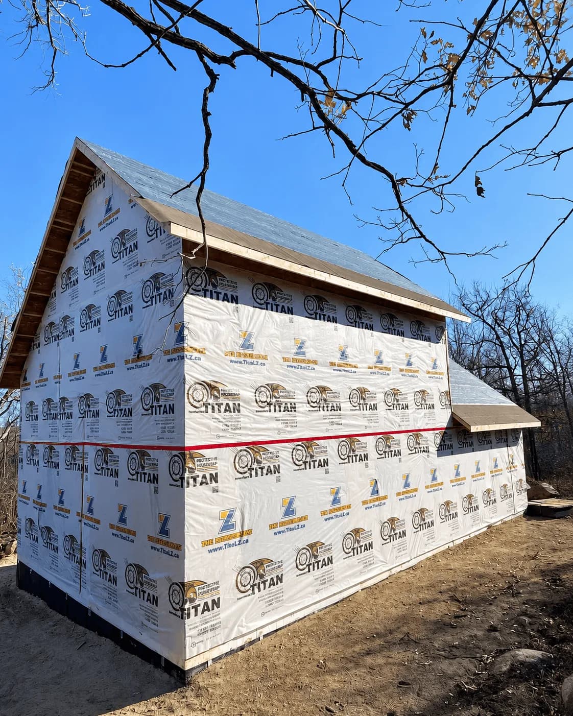 Spartan Builders Custom Home Side Housewrap Roofing